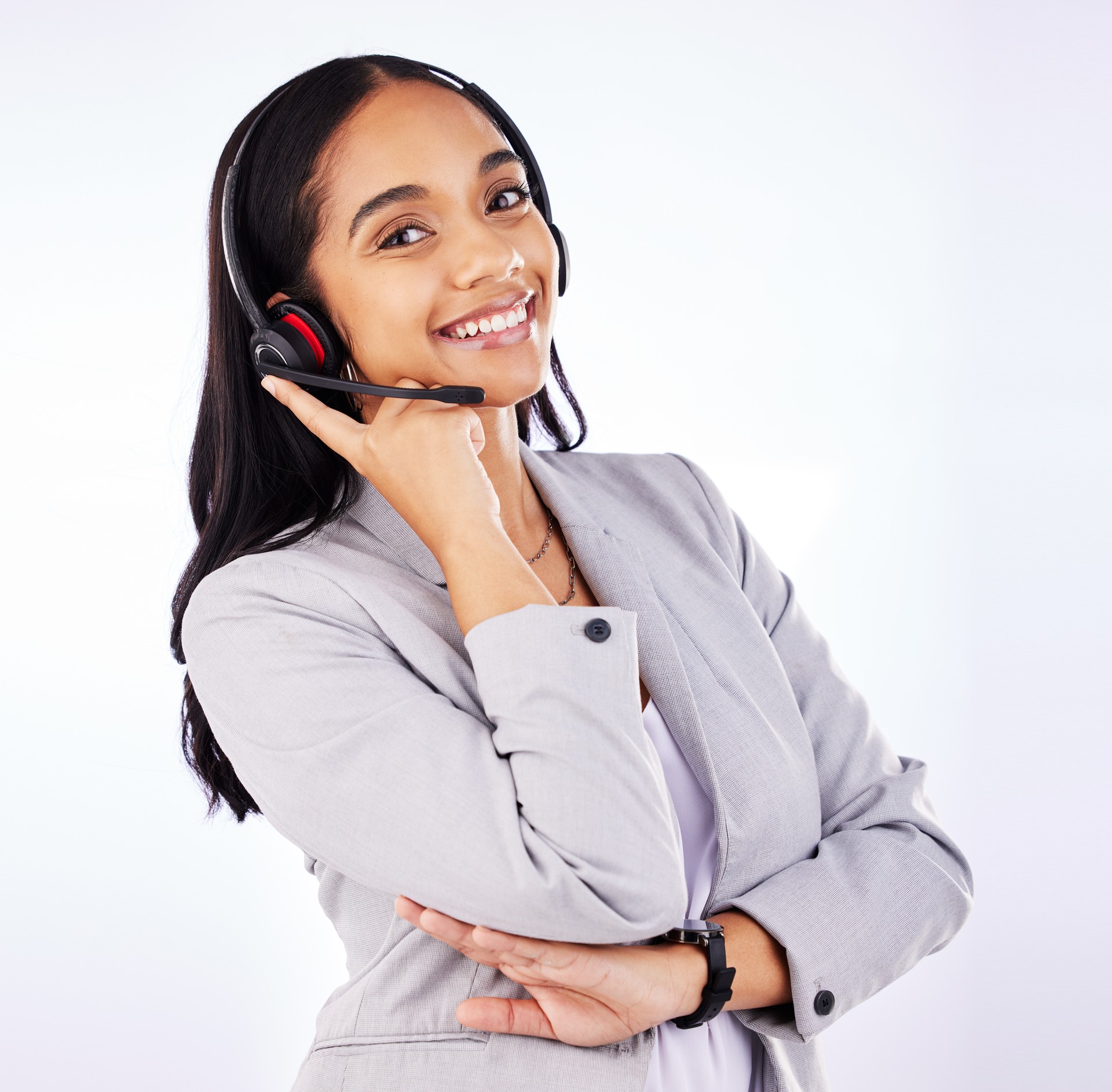 Call center, portrait and woman in studio for customer service, sales advice or support on white background. Face of CRM consultant, receptionist or happy communication of FAQ telemarketing questions